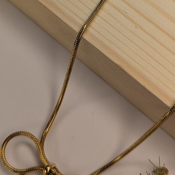 Golden Bow Necklace - Image 3