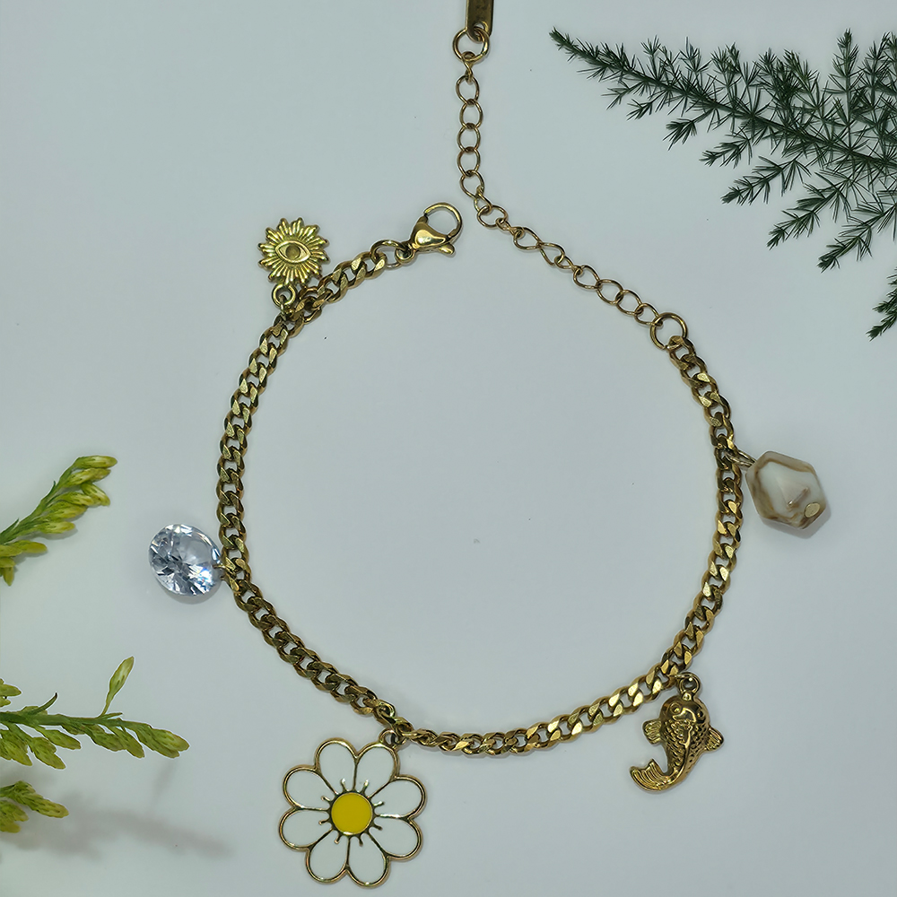 daisy ocean charm bracelet with floral and sea inspired charms