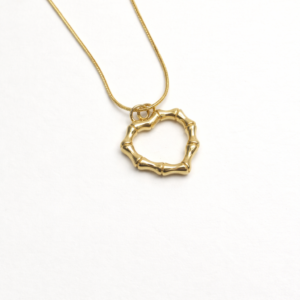 Golden Orbit Pendant with elegant circular design and polished gold finish