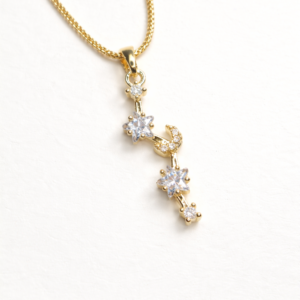 Moon & Star Pendant with elegant celestial design and polished finish