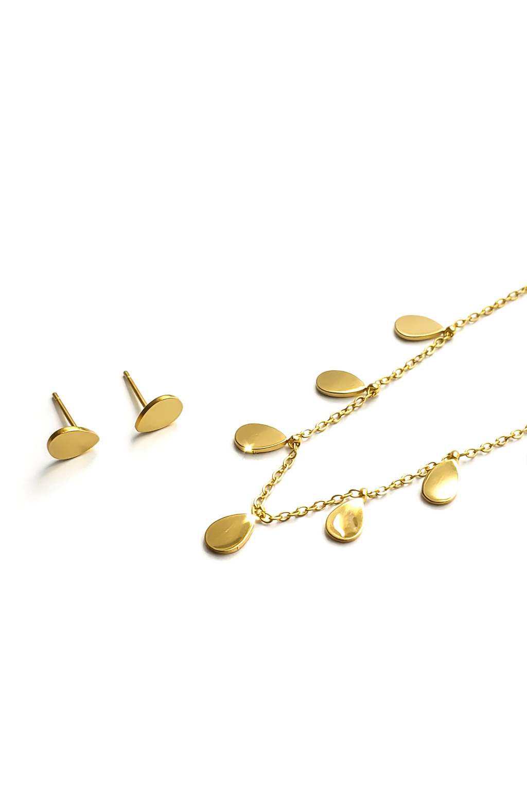 golden teardrop charm set pendant and earrings jewellery